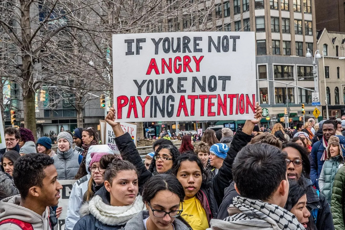 crowds of people protesting