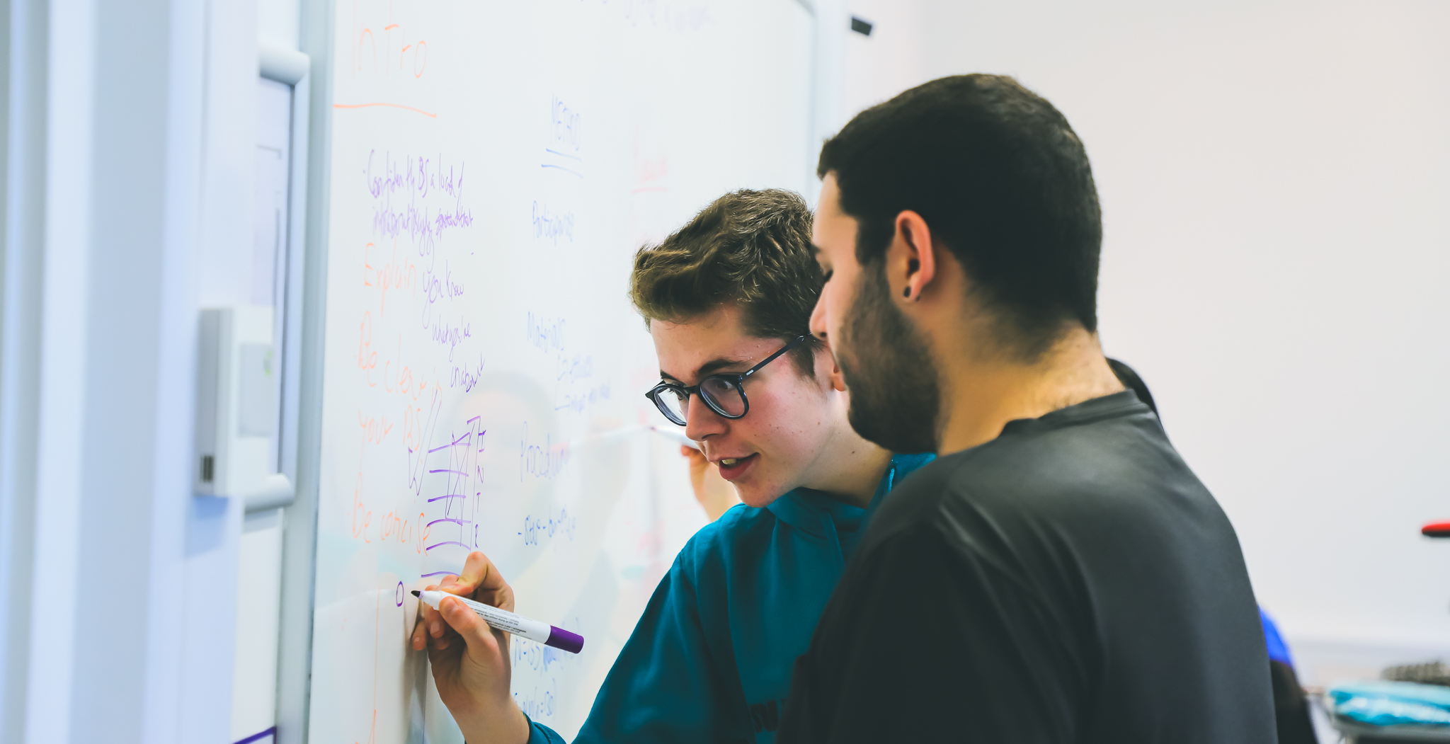 A PAL Leader supporting a student