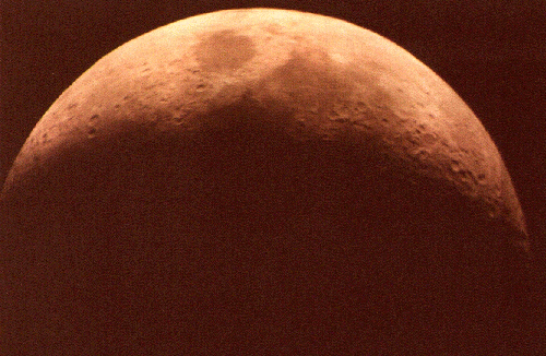 A red cresent moon made with fujicolor 400 film.
