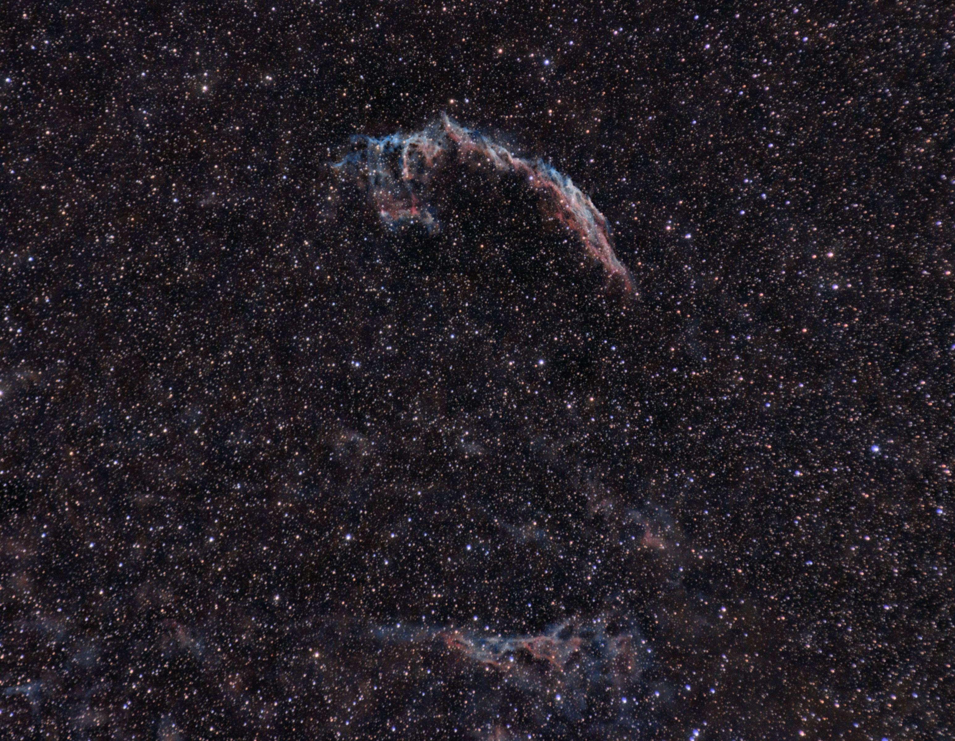 Colour photo of Veil nebula. Eastern veil lies above western veil.