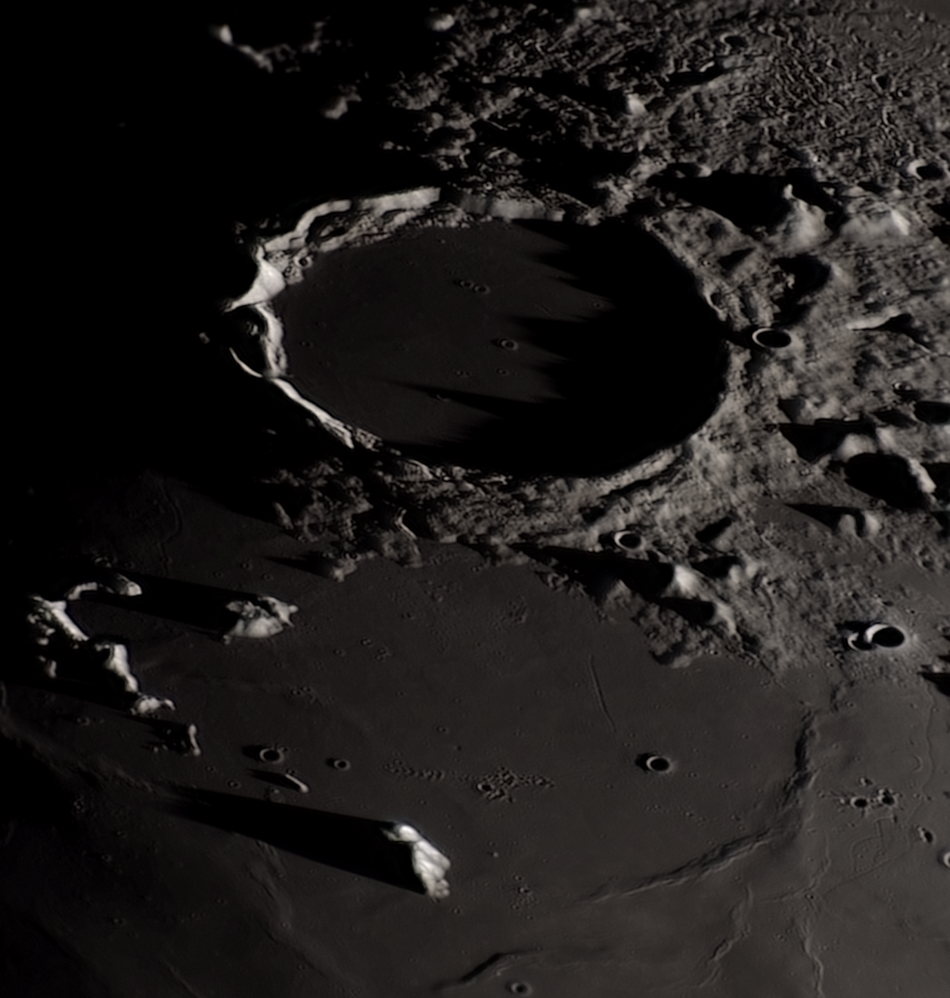 Colour photo of Plato crater on the Moon.