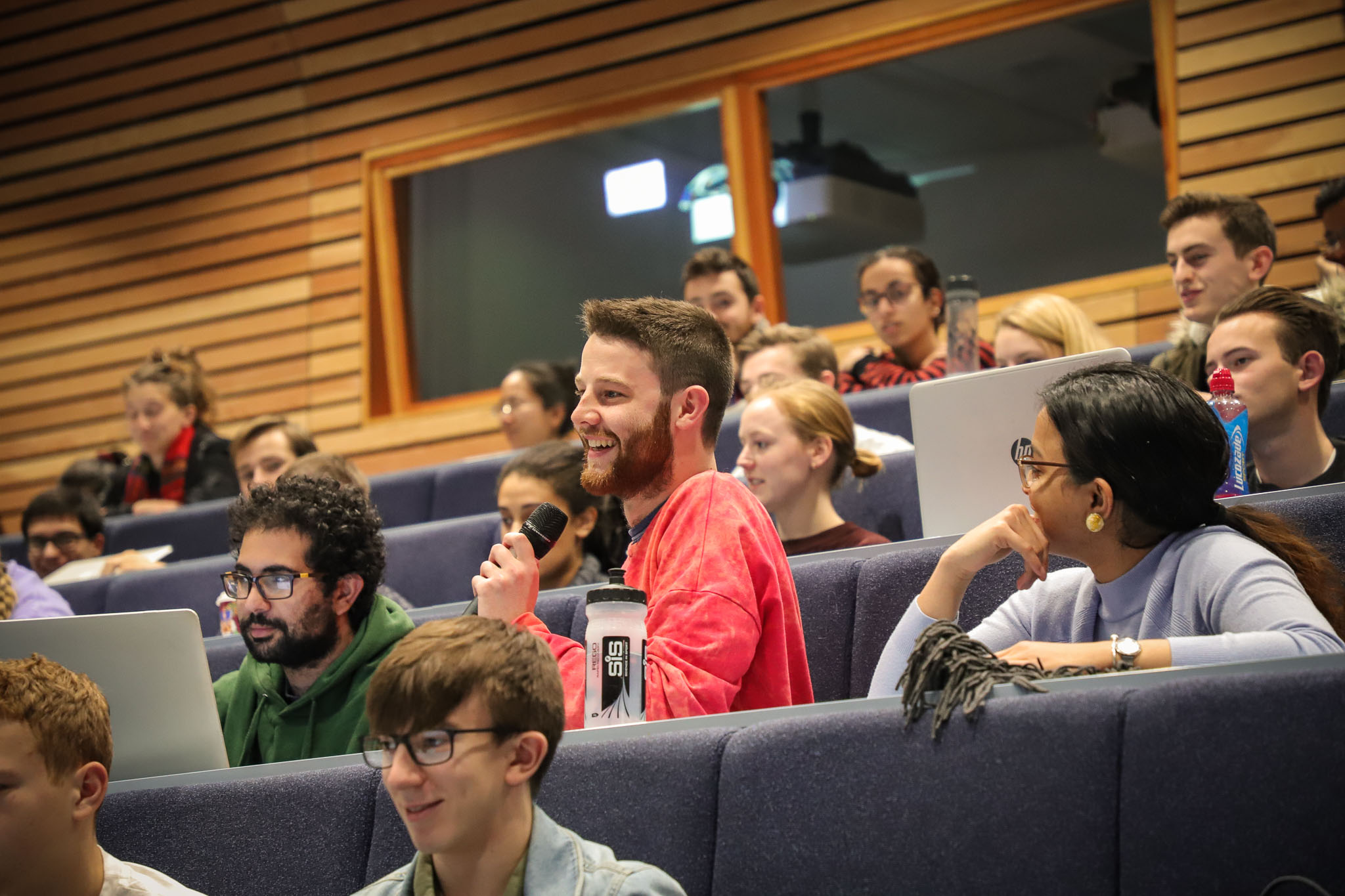 A student with a microphone